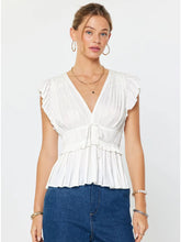 The Pleated Peplum Blouse in White