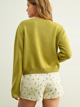 The Ara Cardigan in Pistachio