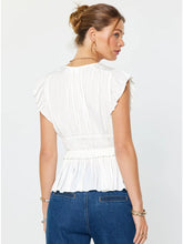 The Pleated Peplum Blouse in White