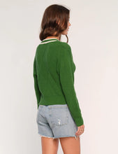 The Clarke Cardi in Grass