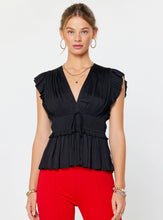 The Pleated Peplum Blouse in Black