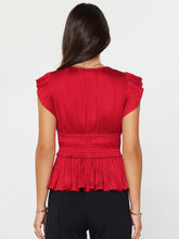 The Pleated Peplum Blouse in Red