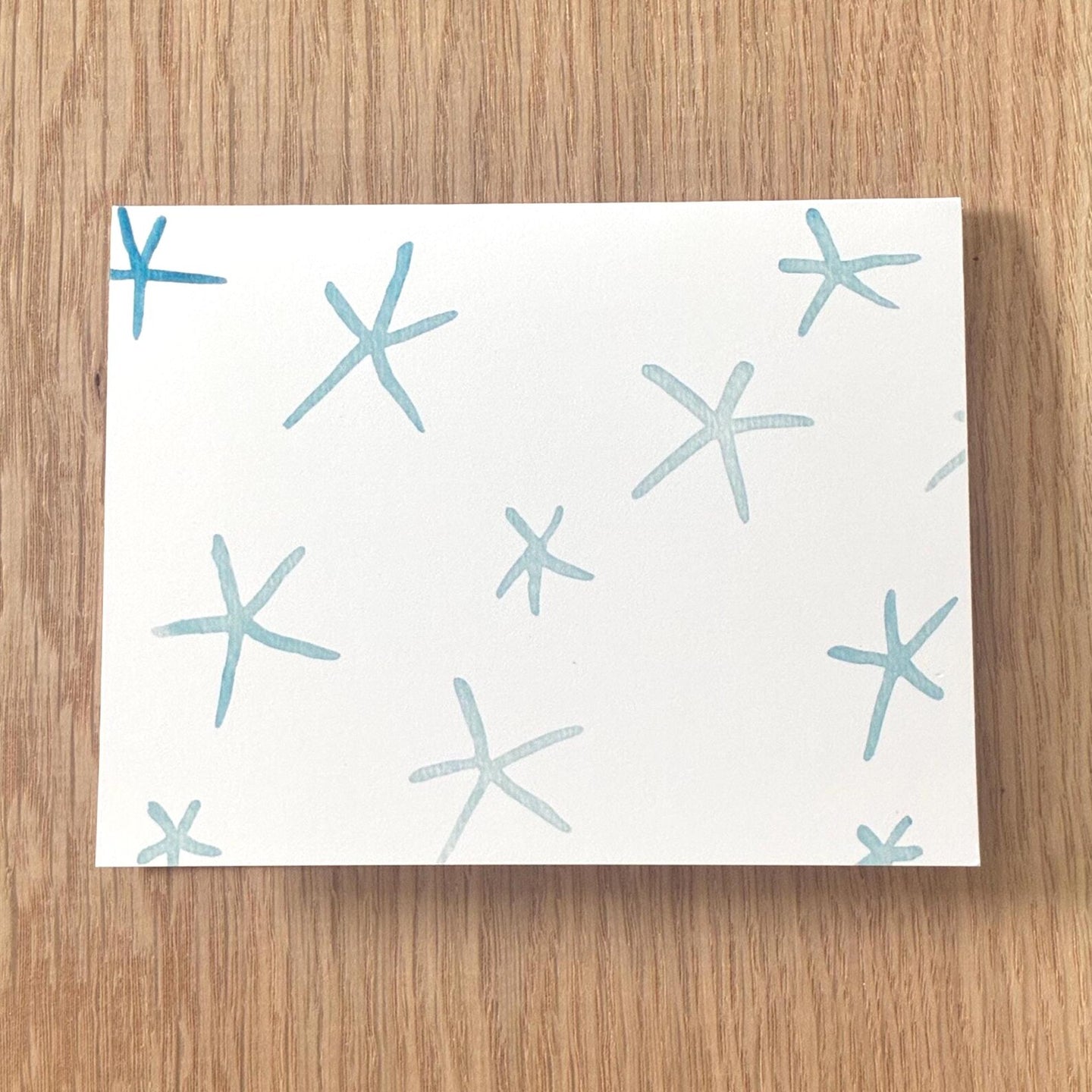 Blue Stars Watercolor Greeting Card by Swell Art Company